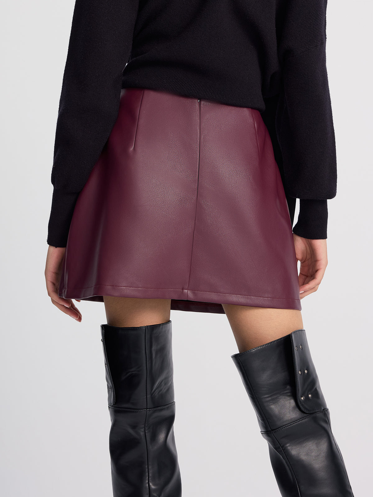 Metal-Detailed Faux Leather Wrap Mini Skirt