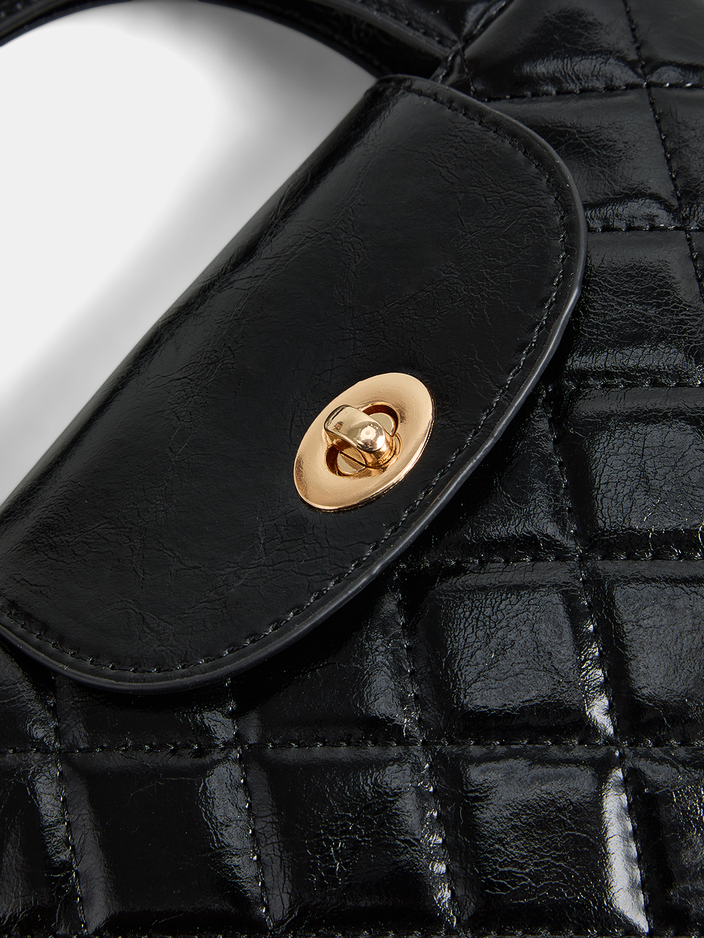Quilted Turn Lock Top Handle Handbag